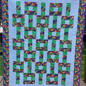 Handmade colorful lap quilt